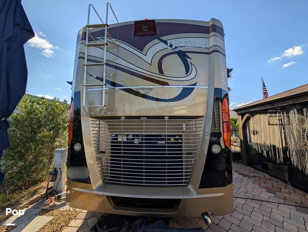2012 Fleetwood Discovery 42A - Used Diesel Pusher For Sale by Pop RVs in Clermont, Florida features Awning, Generator, Leveling Jacks, Air Conditioning, Slideout