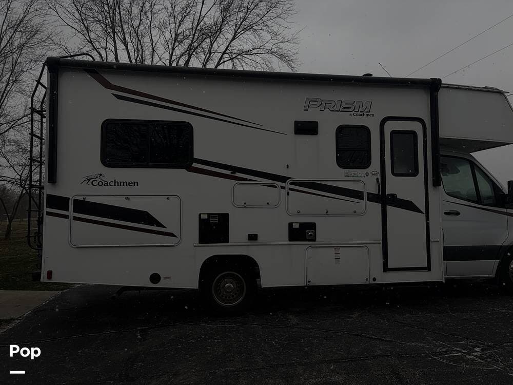 2023 Coachmen Prism LE Series 2150CB - Used Class C For Sale by Pop RVs in Fortville, Indiana features Slideout