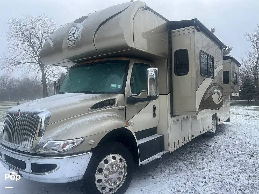 2020 Nexus Wraith 33W - Used Class C For Sale by Pop RVs in North Tonawanda, New York features Generator, Awning, Slideout, Air Conditioning, Leveling Jacks