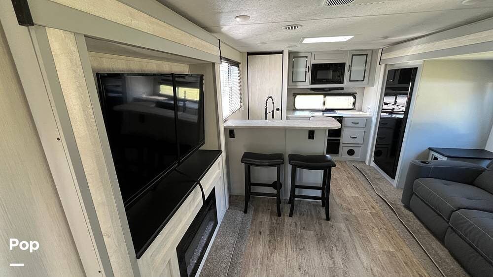 2023 Forest River Vibe 31ML - Used Travel Trailer For Sale by Pop RVs in Parrish, Florida features Air Conditioning, Leveling Jacks, Slideout, Awning