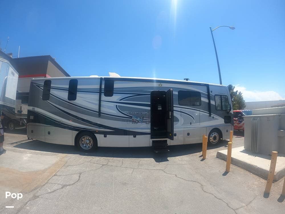 2015 Fleetwood Excursion 35E - Used Diesel Pusher For Sale by Pop RVs in Las Vegas, Nevada features Leveling Jacks, Slideout, Awning, Air Conditioning, Generator