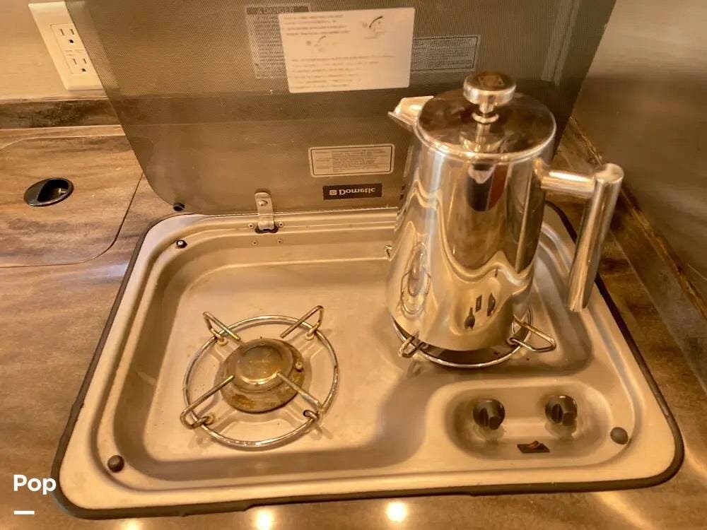 2014 Leisure Travel Unity U24CB - Used Class C For Sale by Pop RVs in Los Angeles, California features Slideout, Awning, Generator, Air Conditioning