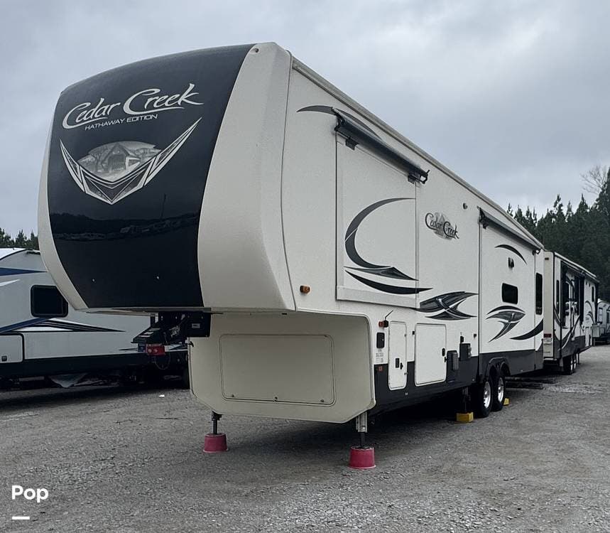 2020 Forest River Cedar Creek 34IK - Used Fifth Wheel For Sale by Pop RVs in Madison, Alabama features Air Conditioning, Awning, Slideout, Leveling Jacks