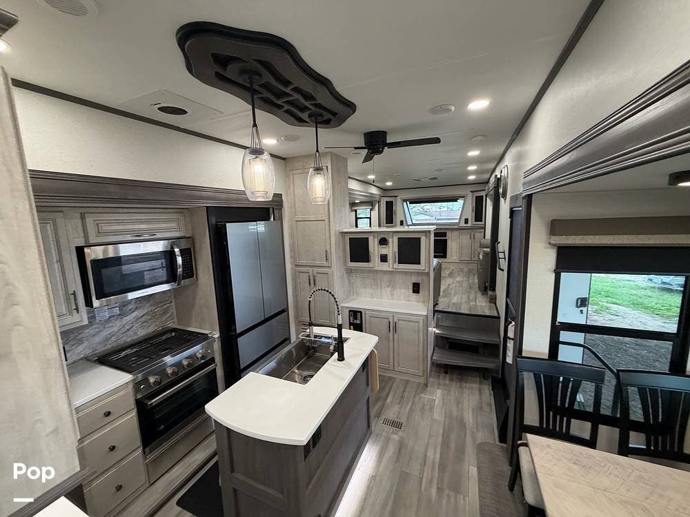 2024 Forest River Sandpiper 3990FL - Used Fifth Wheel For Sale by Pop RVs in Tomball, Texas features Slideout, Awning, Air Conditioning, Leveling Jacks