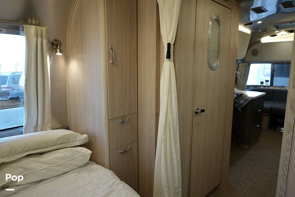 2021 Airstream Globetrotter 25FB - Used Travel Trailer For Sale by Pop RVs in Round Rock, Texas features Air Conditioning, Awning, Leveling Jacks