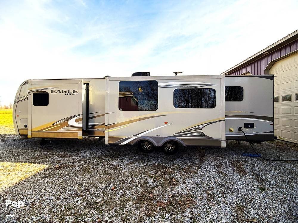 2018 Jayco Eagle HT 295DBOK - Used Travel Trailer For Sale by Pop RVs in Poseyville, Indiana features Leveling Jacks, Awning, Air Conditioning, Slideout