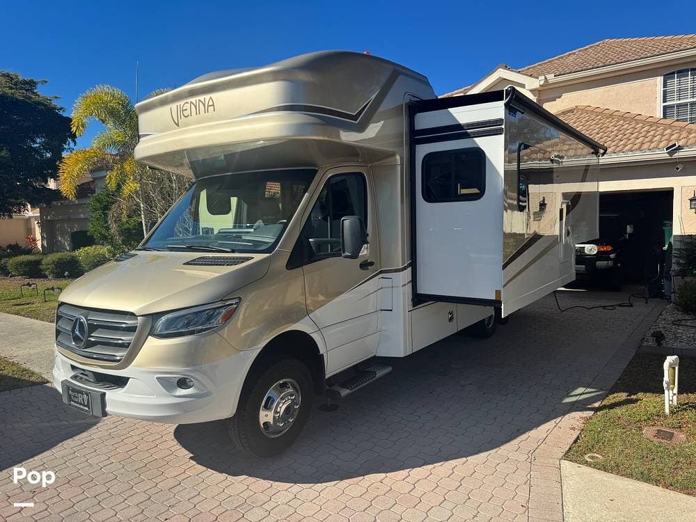 2022 Renegade Vienna 25VFWC - Used Class C For Sale by Pop RVs in Venice, Florida features Awning, Slideout, Air Conditioning, Generator, Leveling Jacks