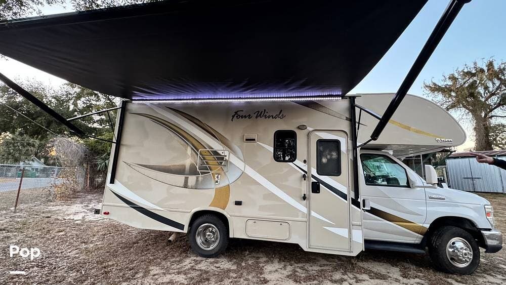 2017 Thor Motor Coach Four Winds 22B - Used Class C For Sale by Pop RVs in Fruitland Park, Florida features Slideout, Awning, Generator, Air Conditioning, Leveling Jacks
