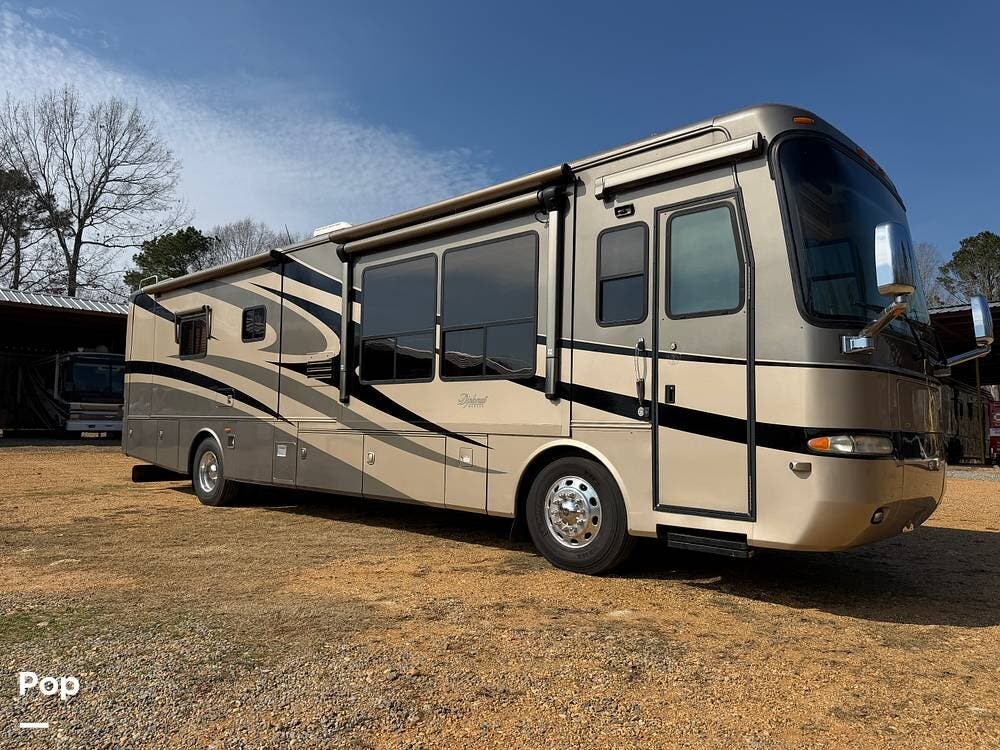 2006 Monaco RV Diplomat 40PAQ - Used Diesel Pusher For Sale by Pop RVs in El Dorado, Arkansas features Awning, Leveling Jacks, Generator, Air Conditioning, Slideout