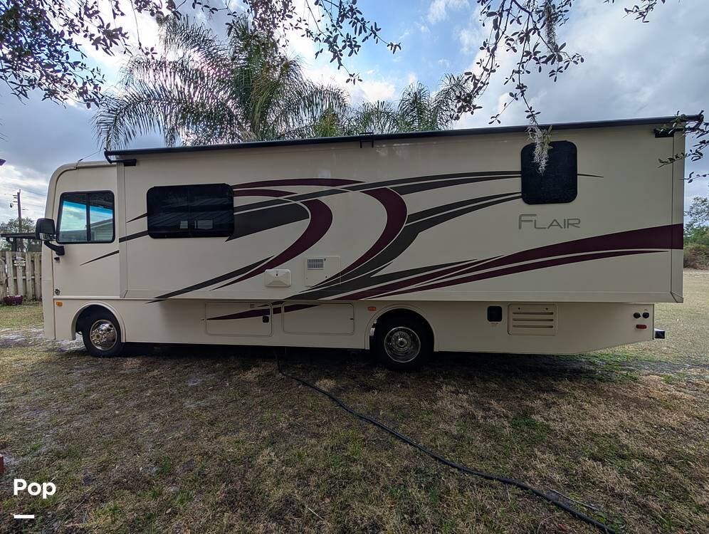 2020 Fleetwood Flair 29M - Used Class A For Sale by Pop RVs in Mims, Florida features Awning, Generator, Air Conditioning, Slideout, Leveling Jacks