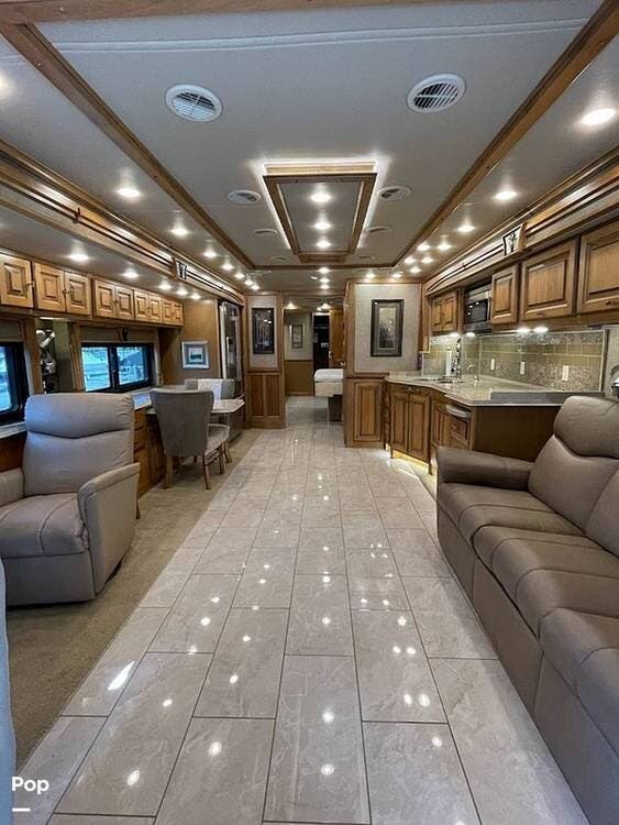 2017 Tiffin Phaeton M-44OH Powerglide 450hp - Used Diesel Pusher For Sale by Pop RVs in Hernando, Florida features Slideout