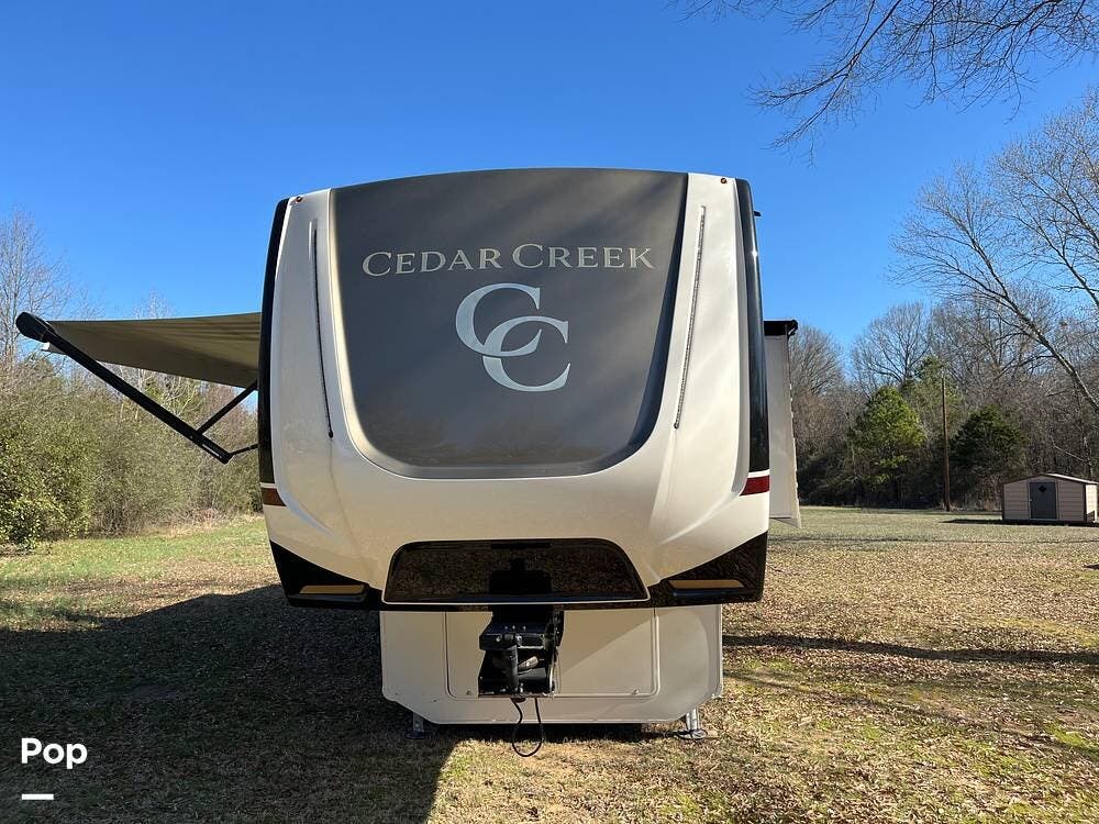 2021 Forest River Cedar Creek 388RK - Used Fifth Wheel For Sale by Pop RVs in Morrilton, Arkansas features Air Conditioning, Leveling Jacks, Slideout, Awning