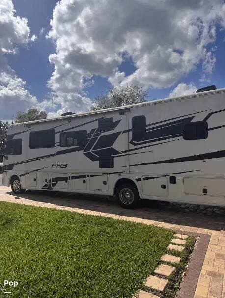 2023 Forest River FR3 33DS - Used Class A For Sale by Pop RVs in Ocala, Florida features Awning, Leveling Jacks, Air Conditioning, Generator, Slideout