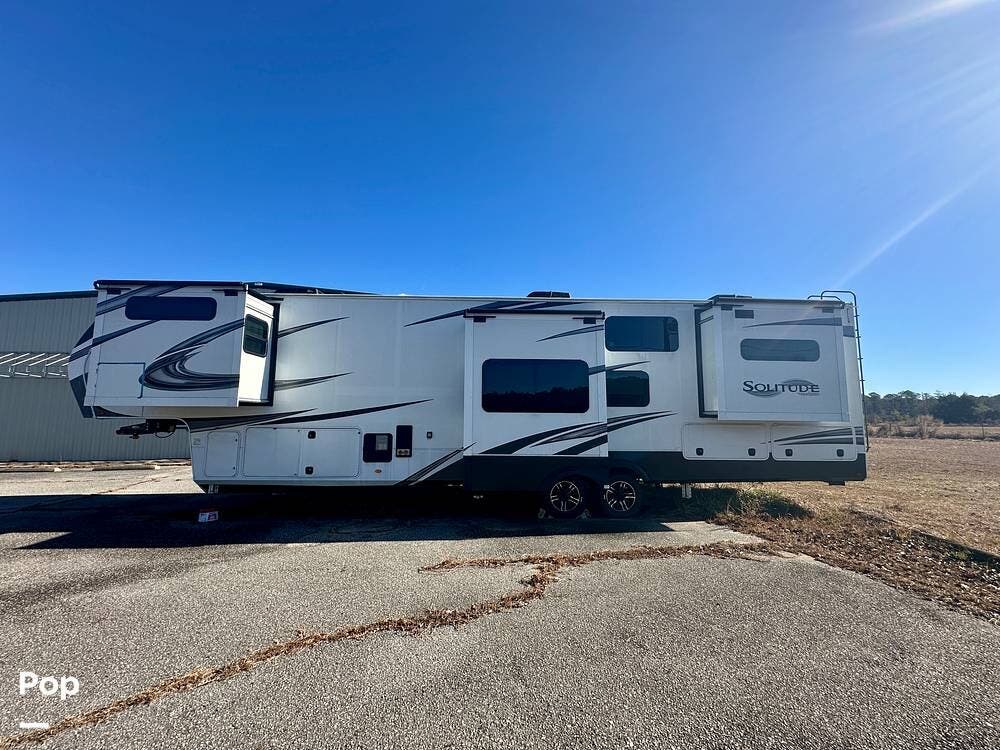 2023 Grand Design Solitude 390RK - Used Fifth Wheel For Sale by Pop RVs in Longs, South Carolina features Awning, Leveling Jacks, Slideout, Air Conditioning