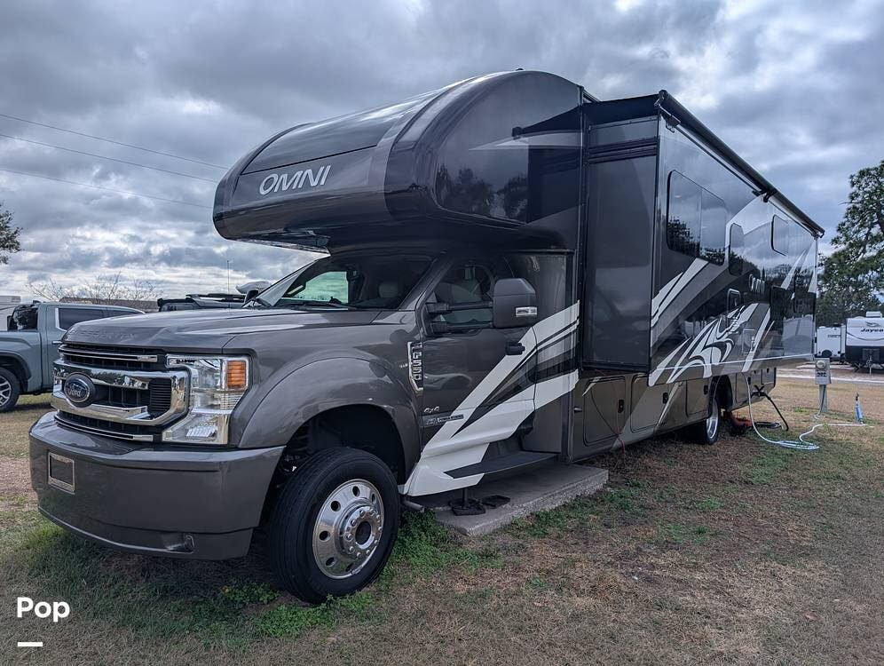 2021 Thor Motor Coach Omni RB34 - Used Super C For Sale by Pop RVs in Clermont, Florida features Awning, Leveling Jacks, Generator, Air Conditioning, Slideout
