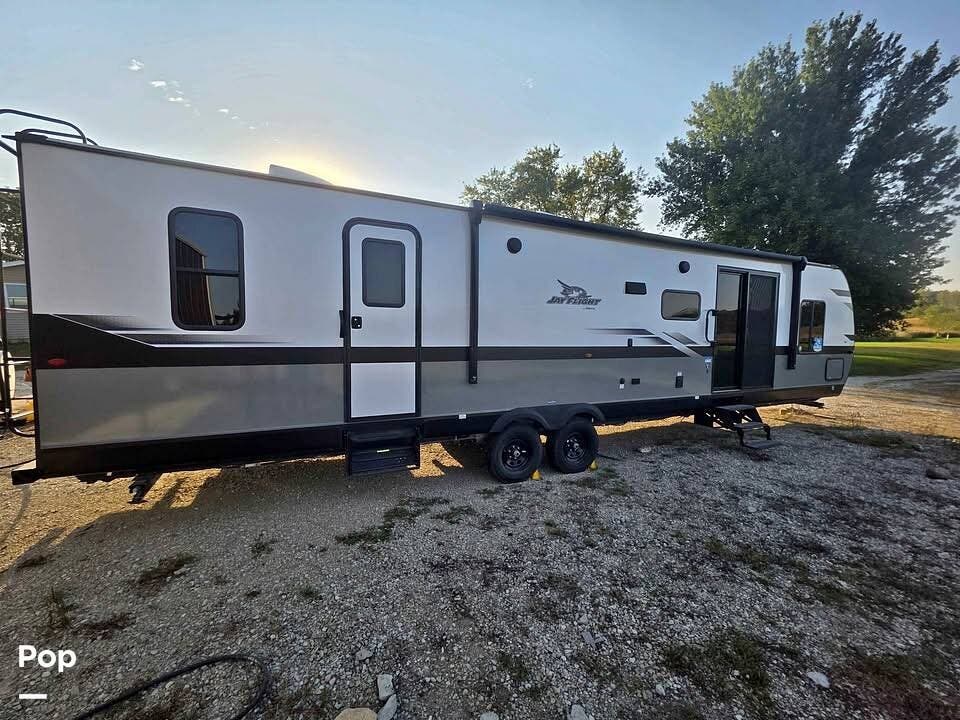 2024 Jayco Jay Flight 380DQS - Used Travel Trailer For Sale by Pop RVs in Charles City, Iowa features Leveling Jacks, Awning, Air Conditioning, Slideout