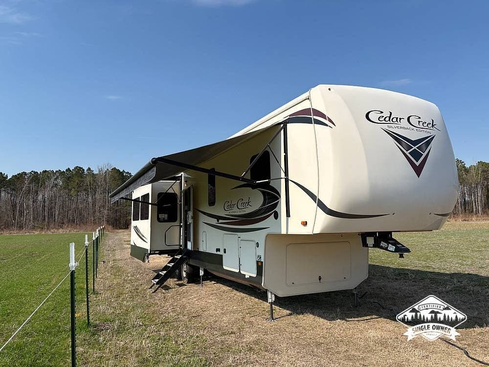 2021 Forest River Cedar Creek 37MBH - Used Fifth Wheel For Sale by Pop RVs in Vanceboro, North Carolina features Air Conditioning, Leveling Jacks, Slideout, Awning