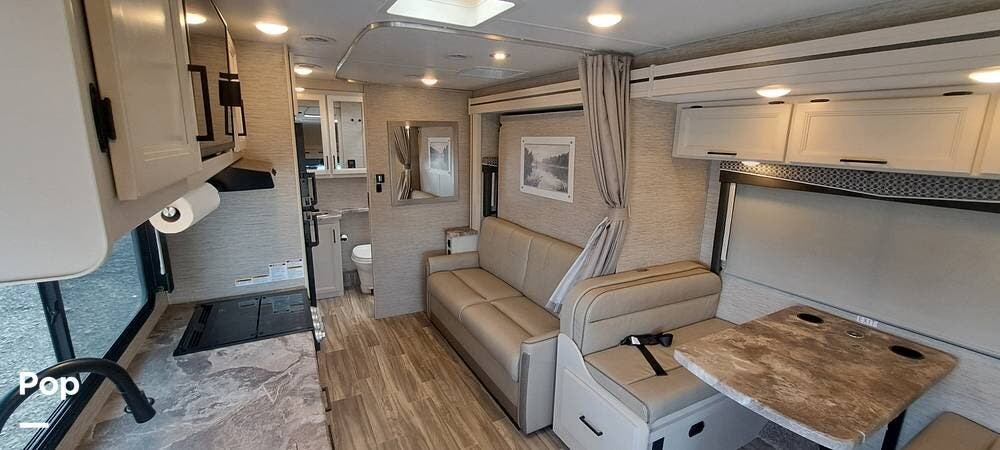 2023 Thor Motor Coach Four Winds 24LT - Used Class C For Sale by Pop RVs in Brighton, Colorado features Leveling Jacks, Awning, Generator, Air Conditioning, Slideout