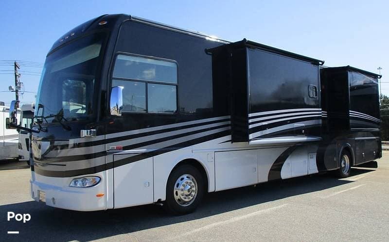 2013 Thor Motor Coach Tuscany XTE 40EX - Used Diesel Pusher For Sale by Pop RVs in Gansevoort, New York features Leveling Jacks, Slideout, Generator, Awning, Air Conditioning
