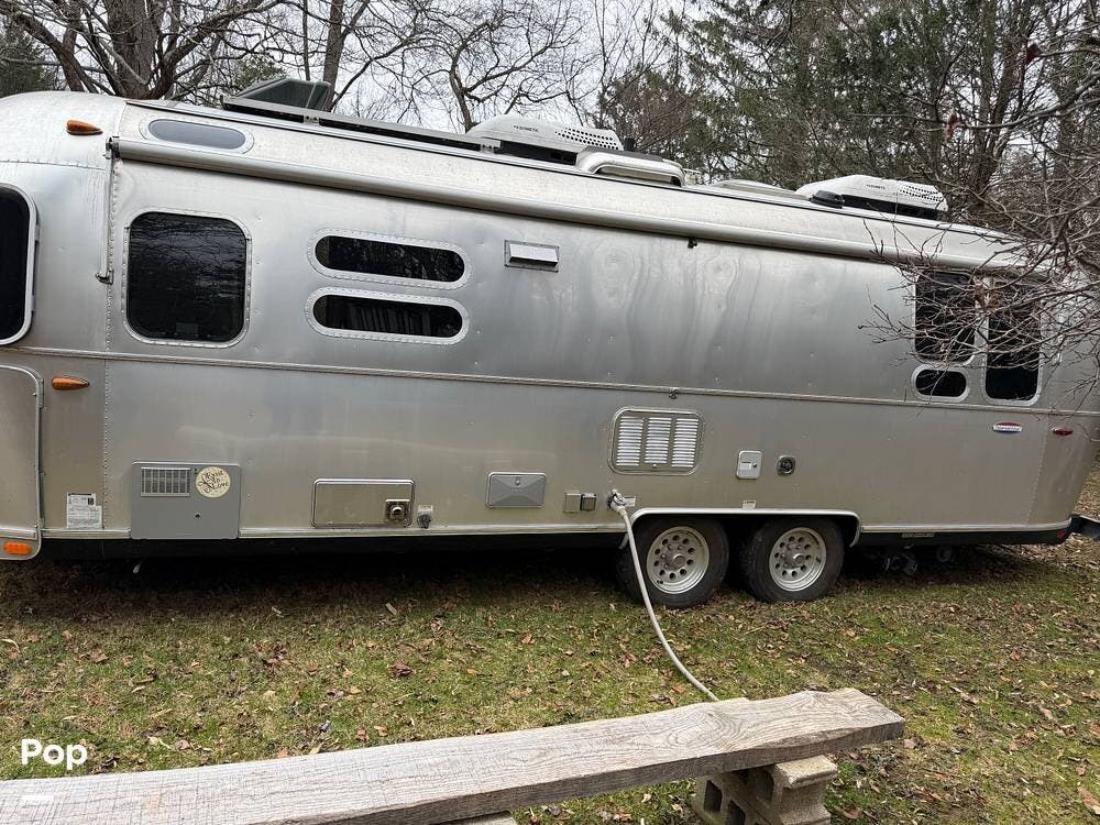 2019 Airstream International Serenity 28RB - Used Travel Trailer For Sale by Pop RVs in Spring Valley, New York features Slideout, Awning, Leveling Jacks, Air Conditioning