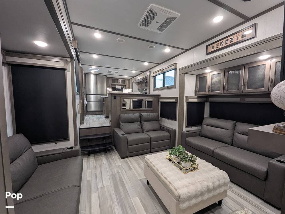 2024 Grand Design Solitude 390RK - Used Fifth Wheel For Sale by Pop RVs in Apollo Beach, Florida features Leveling Jacks, Air Conditioning, Slideout, Awning