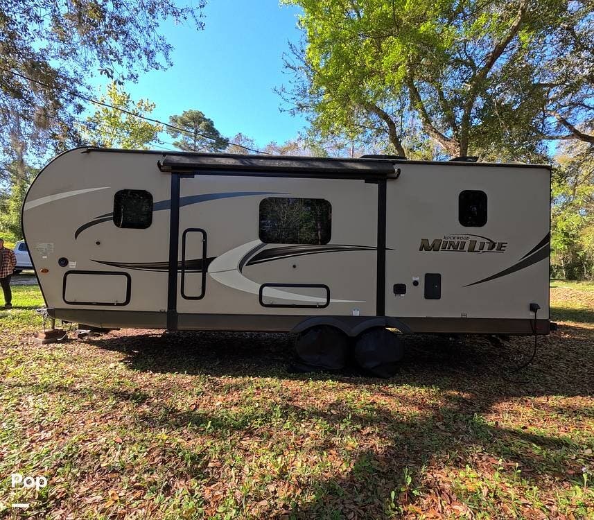2020 Rockwood Mini Lite 2509S - Used Travel Trailer For Sale by Pop RVs in Saint Augustine, Florida features Leveling Jacks, Air Conditioning, Awning, Slideout