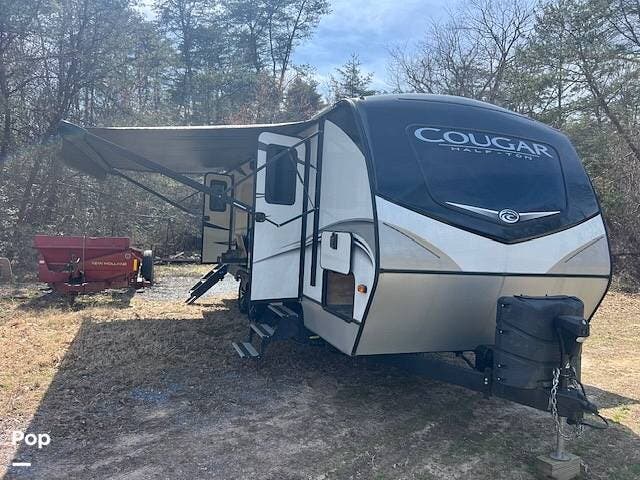2020 Keystone Cougar 26RBS - Used Travel Trailer For Sale by Pop RVs in Pasadena, Maryland features Leveling Jacks, Slideout, Air Conditioning