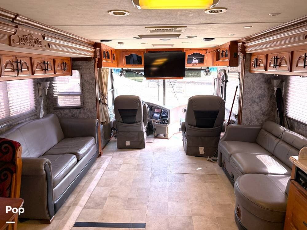 2006 Coachmen Sportscoach Encore 40TS - Used Diesel Pusher For Sale by Pop RVs in Escondido, California features Leveling Jacks, Awning, Generator, Air Conditioning, Slideout