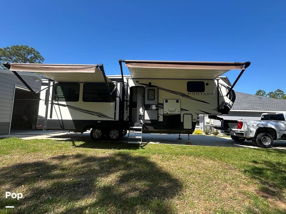 2021 Keystone Montana High Country 295RL - Used Fifth Wheel For Sale by Pop RVs in Beverly Hills, Florida features Air Conditioning, Slideout, Awning