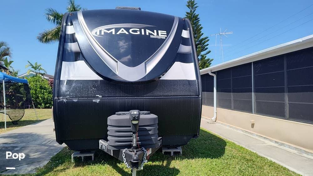 2024 Grand Design Imagine 3100RD - Used Travel Trailer For Sale by Pop RVs in Naples, Florida features Slideout, Awning, Air Conditioning, Leveling Jacks