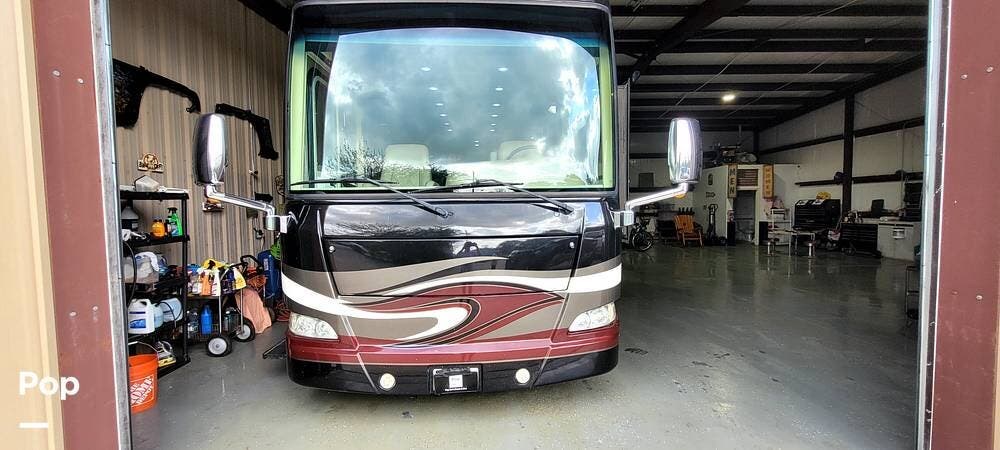 2011 Thor Motor Coach Tuscany 42FK - Used Diesel Pusher For Sale by Pop RVs in Kemah, Texas features Air Conditioning, Leveling Jacks, Generator, Awning, Slideout