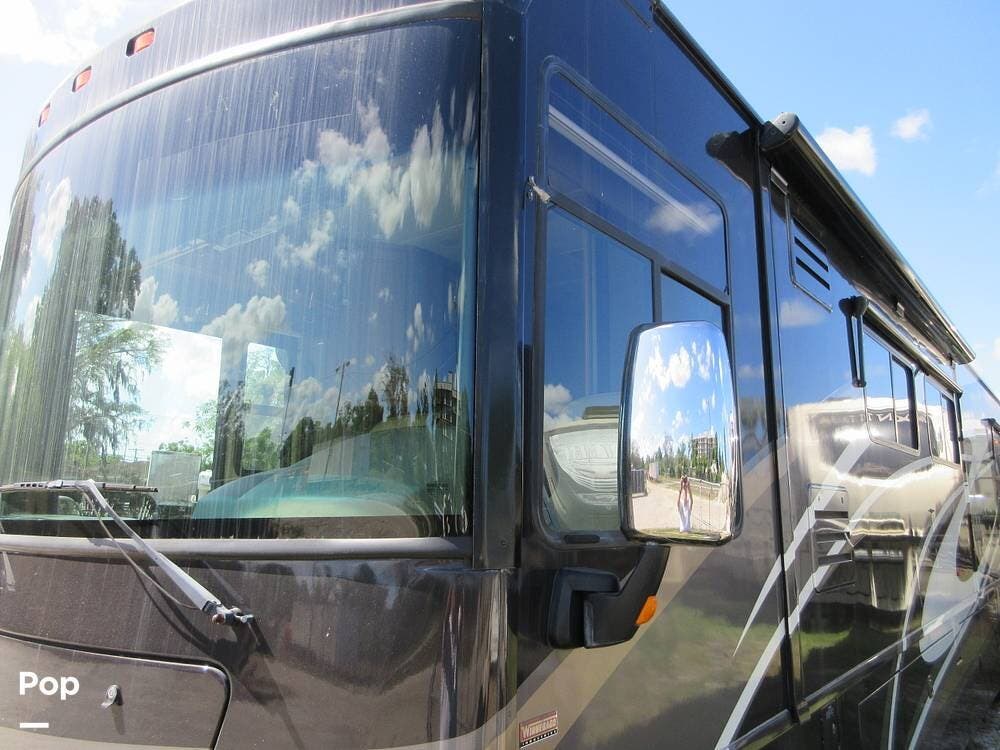 2010 Winnebago Journey 40T - Used Diesel Pusher For Sale by Pop RVs in Tampa, Florida features Generator, Air Conditioning, Leveling Jacks, Awning, Slideout