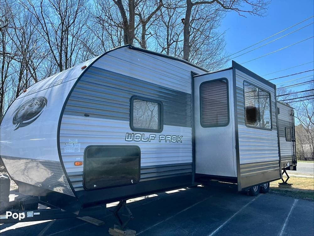 2018 Forest River Wolf Pack 25PACK12+ - Used Toy Hauler For Sale by Pop RVs in Port Jefferson Station, New York features Air Conditioning, Slideout, Awning, Leveling Jacks