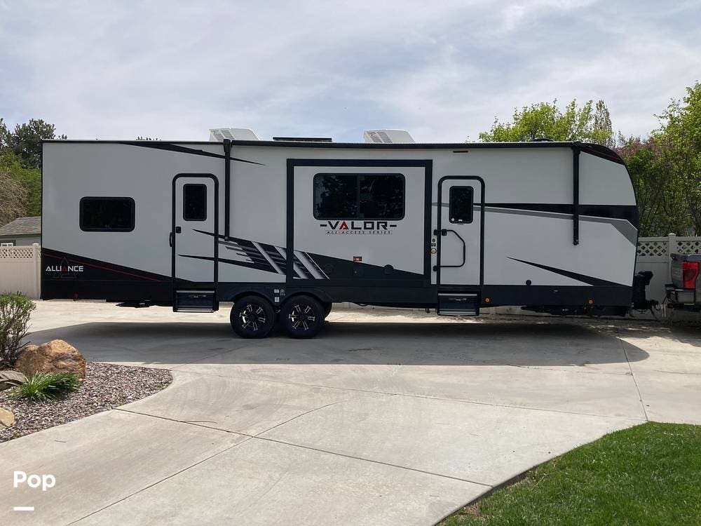 2023 Alliance RV Valor 31T13 - Used Toy Hauler For Sale by Pop RVs in Boise, Idaho features Awning, Air Conditioning, Slideout, Leveling Jacks, Generator