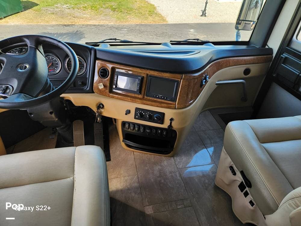 2016 Fleetwood Discovery 40E - Used Diesel Pusher For Sale by Pop RVs in Palmetto, Florida features Air Conditioning, Leveling Jacks, Generator, Slideout