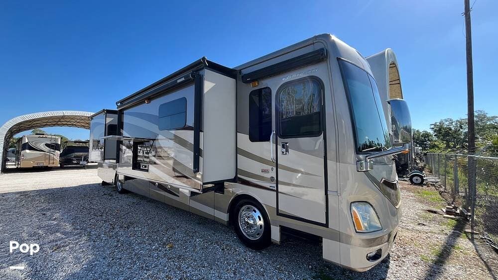 2016 Fleetwood Discovery 40E - Used Diesel Pusher For Sale by Pop RVs in Palmetto, Florida features Awning, Air Conditioning, Slideout, Leveling Jacks, Generator