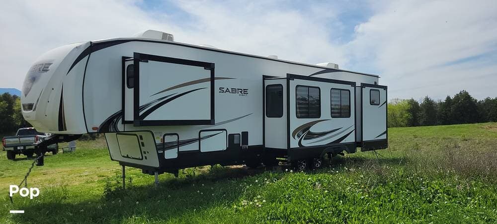 2021 Forest River Sabre 38DBQ - Used Fifth Wheel For Sale by Pop RVs in Sevierville, Tennessee features Slideout, Air Conditioning, Awning
