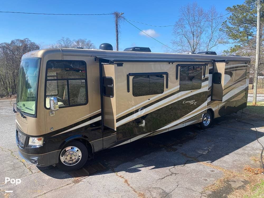 2015 Newmar Canyon Star 3953 - Used Class A For Sale by Pop RVs in Jasper, Georgia features Slideout, Leveling Jacks, Air Conditioning, Awning, Generator