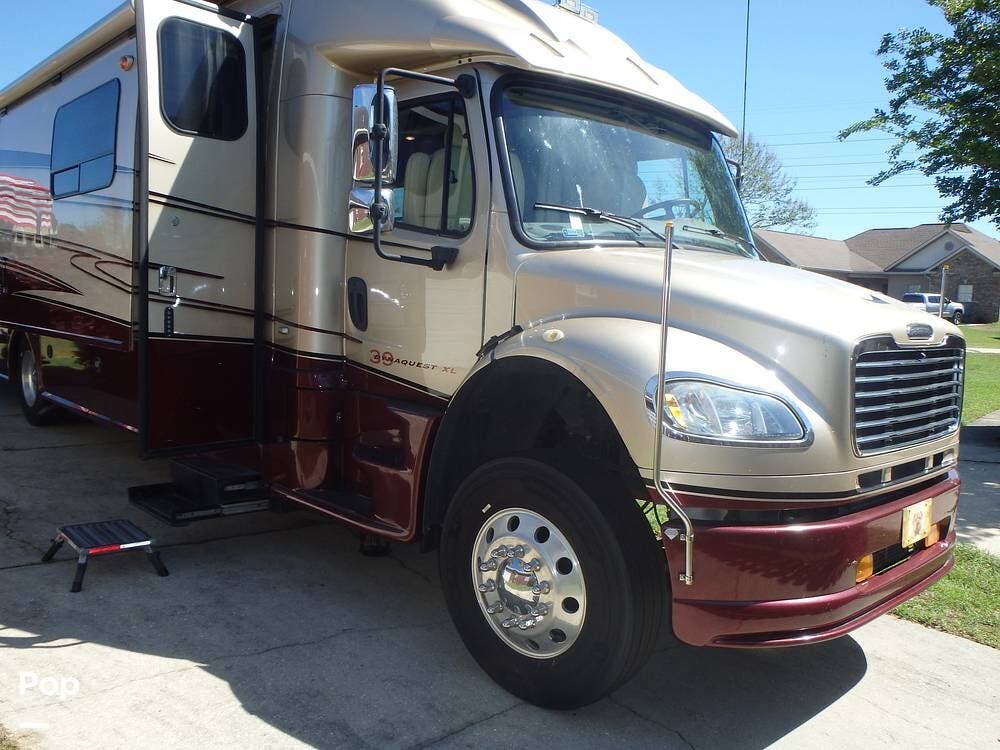 2012 Dynamax Corp DynaQuest 390XL - Used Super C For Sale by Pop RVs in Mobile, Alabama features Air Conditioning, Awning, Generator, Slideout