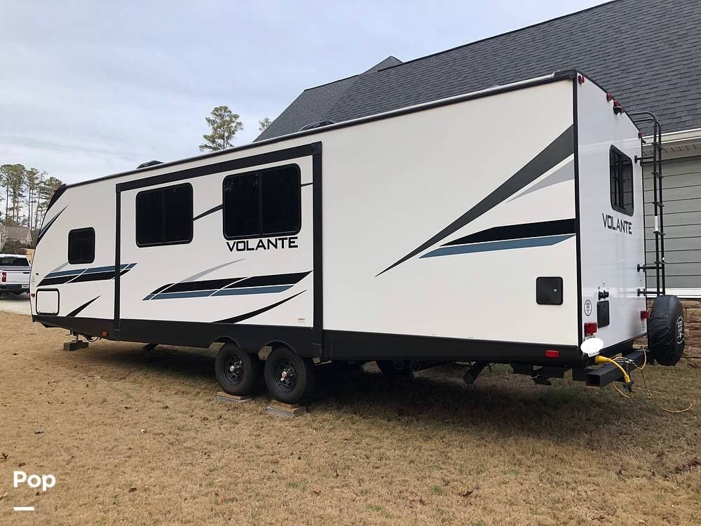 2023 CrossRoads Volante 29RB - Used Travel Trailer For Sale by Pop RVs in Powder Springs, Georgia features Air Conditioning, Leveling Jacks, Awning, Slideout