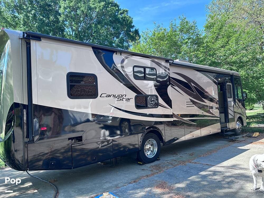 2011 Newmar Canyon Star 3810 - Used Class A For Sale by Pop RVs in Raleigh, North Carolina features Air Conditioning, Slideout, Leveling Jacks, Generator