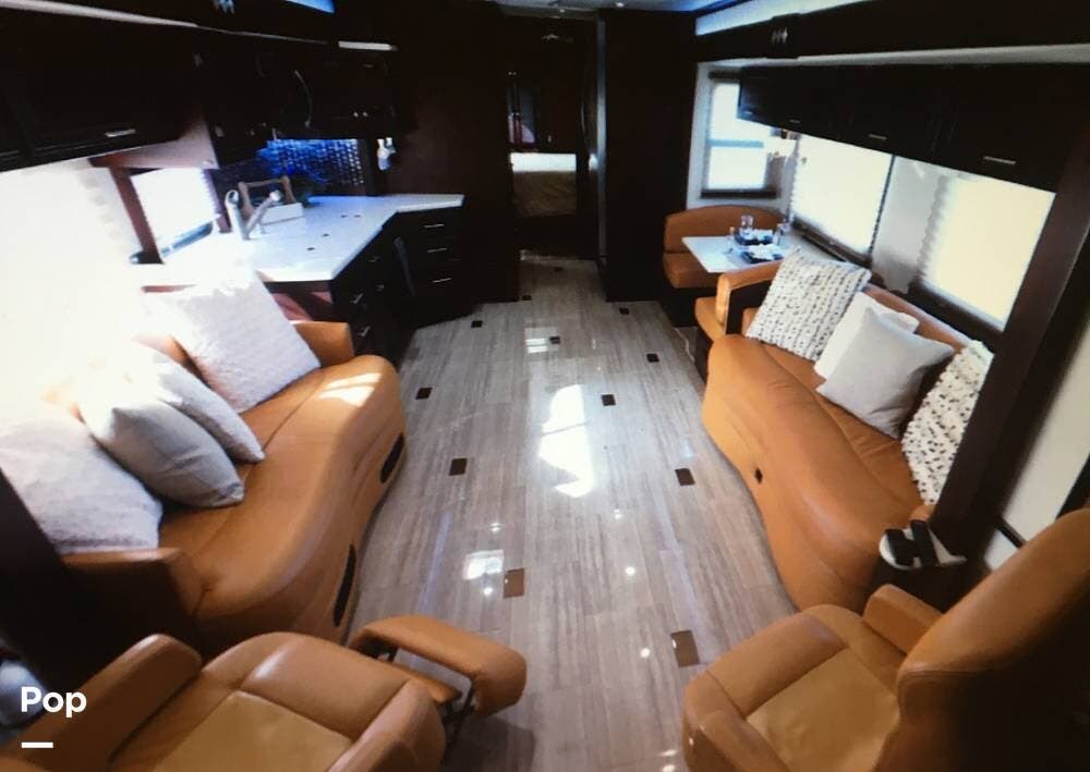 2005 Fleetwood Revolution 40E - Used Diesel Pusher For Sale by Pop RVs in Eufaula, Oklahoma features Awning, Air Conditioning, Slideout, Leveling Jacks, Generator