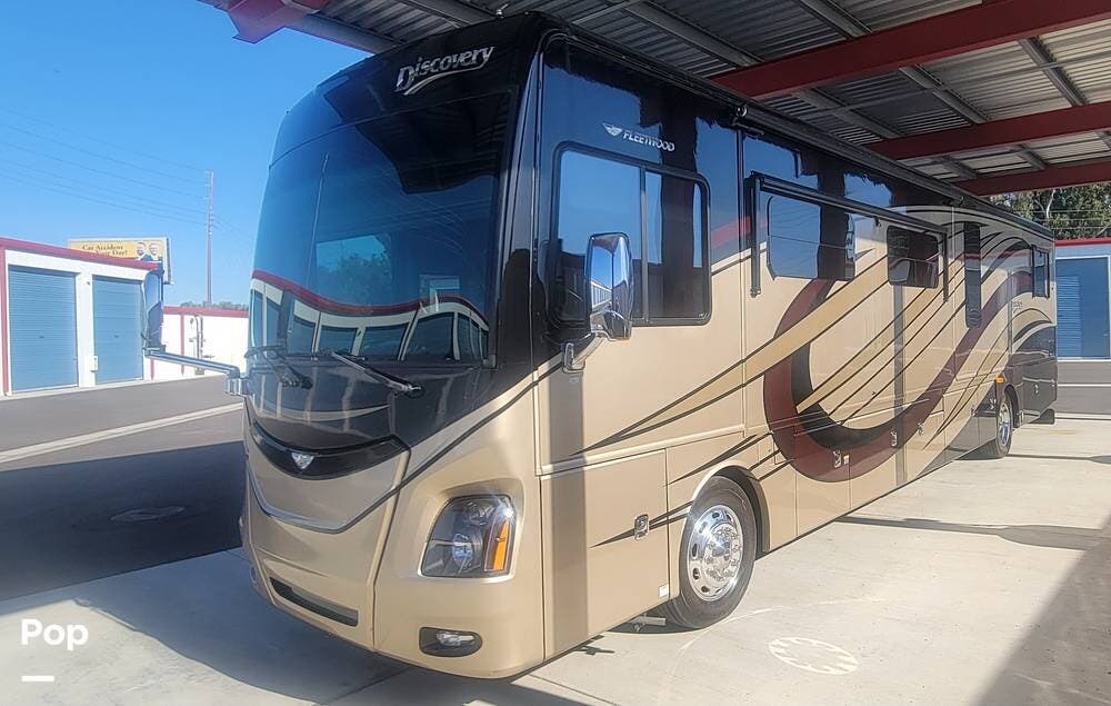 2015 Fleetwood Discovery 40X - Used Diesel Pusher For Sale by Pop RVs in Ripon, California features Air Conditioning, Generator, Leveling Jacks, Slideout, Awning