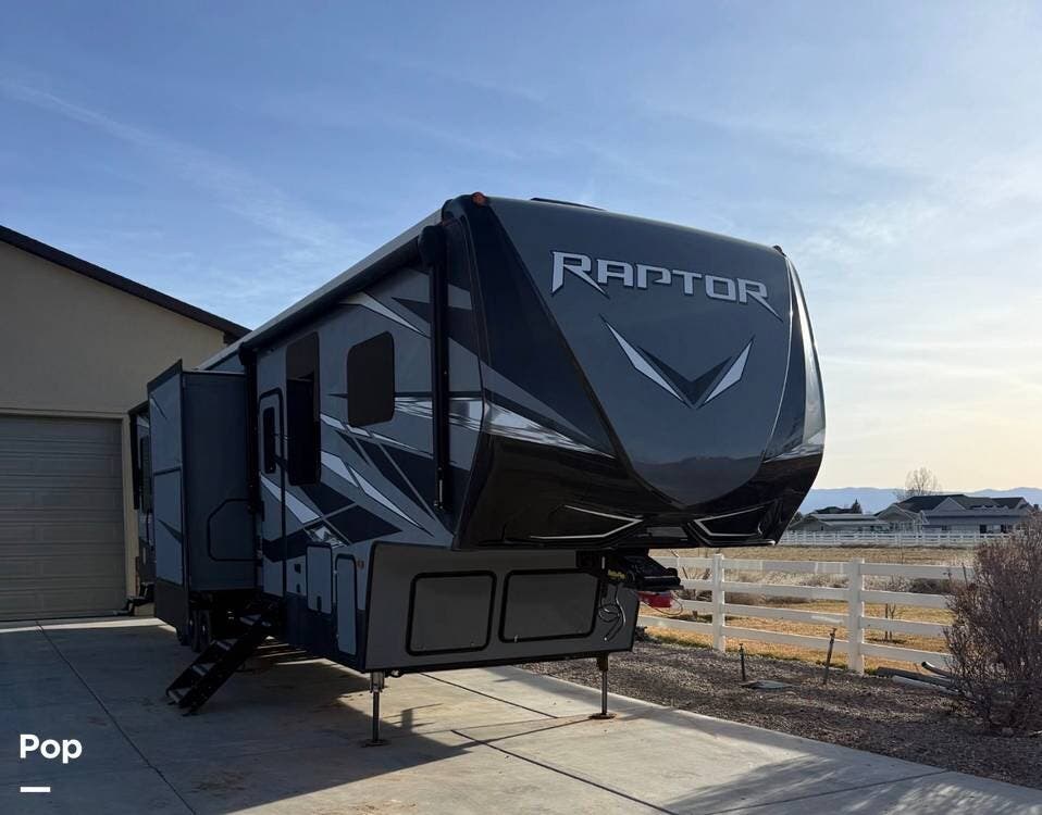 2021 Keystone Raptor Keystone  423 - Used Toy Hauler For Sale by Pop RVs in Cedar City, Utah features Slideout, Awning, Generator, Air Conditioning
