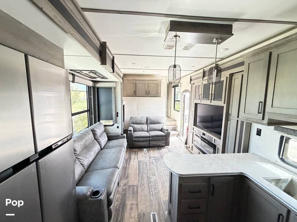 2021 Keystone Raptor 423 - Used Toy Hauler For Sale by Pop RVs in Cedar City, Utah features Awning, Leveling Jacks, Slideout, Air Conditioning, Generator