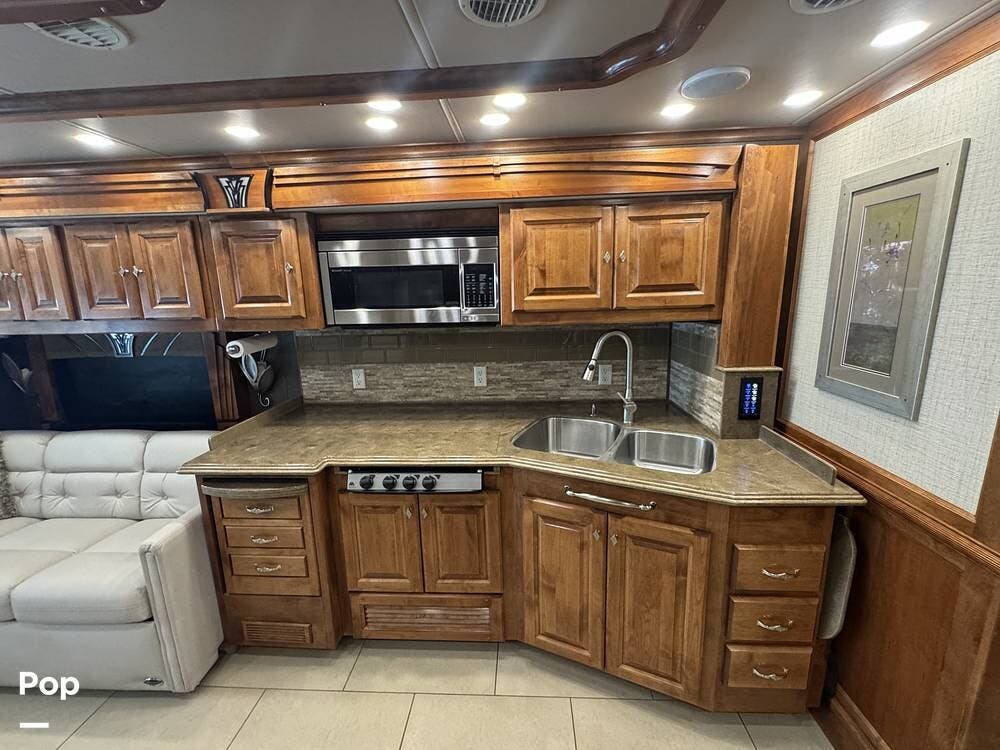 2016 Tiffin Phaeton 40QBH - Used Diesel Pusher For Sale by Pop RVs in Pell City, Alabama features Awning, Air Conditioning, Leveling Jacks, Slideout, Generator