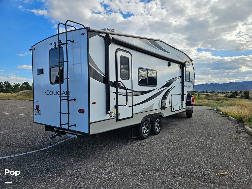 2022 Keystone Cougar Series M-23 MLS - Used Fifth Wheel For Sale by Pop RVs in Littleton, Colorado features Air Conditioning, Leveling Jacks, Awning, Slideout