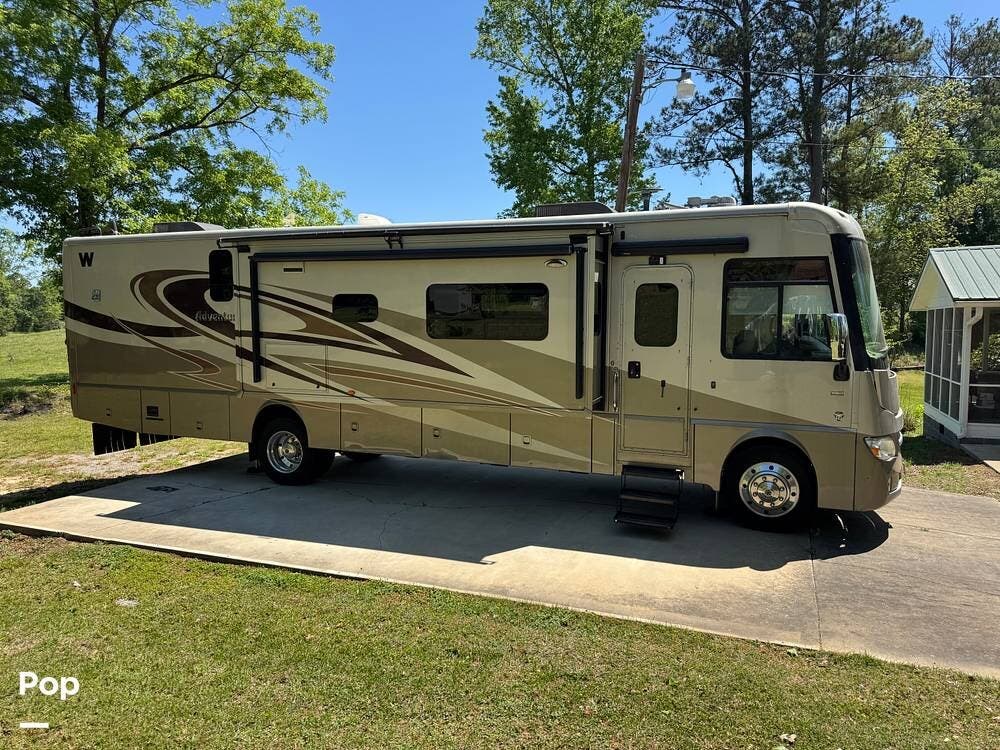 2014 Winnebago Adventurer 38Q - Used Class A For Sale by Pop RVs in Alexander City, Alabama features Generator, Leveling Jacks, Air Conditioning, Awning, Slideout