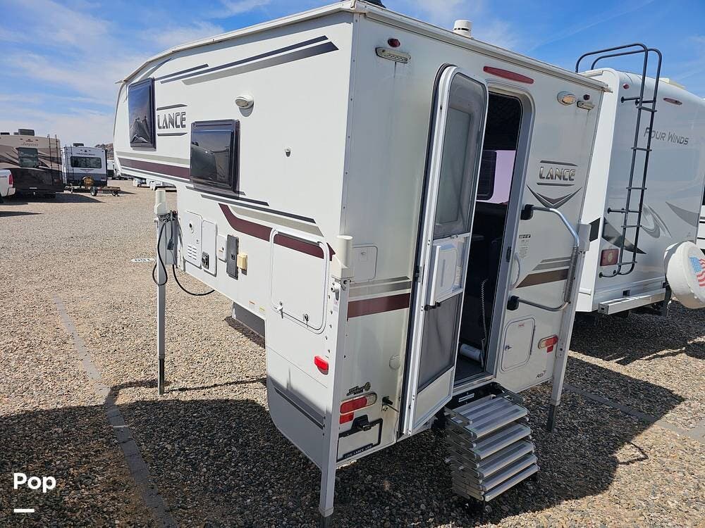 2021 Lance Lance 650 - Used Truck Camper For Sale by Pop RVs in Prescott, Arizona features Leveling Jacks, Awning, Air Conditioning