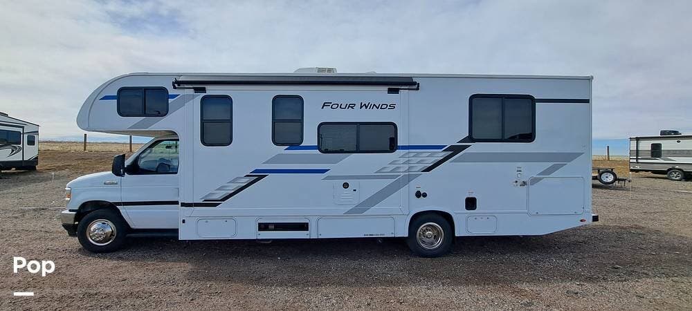 2027 Thor Motor Coach Four Winds 28Z - Used Class C For Sale by Pop RVs in Aurora, Colorado features Air Conditioning, Slideout, Generator, Awning